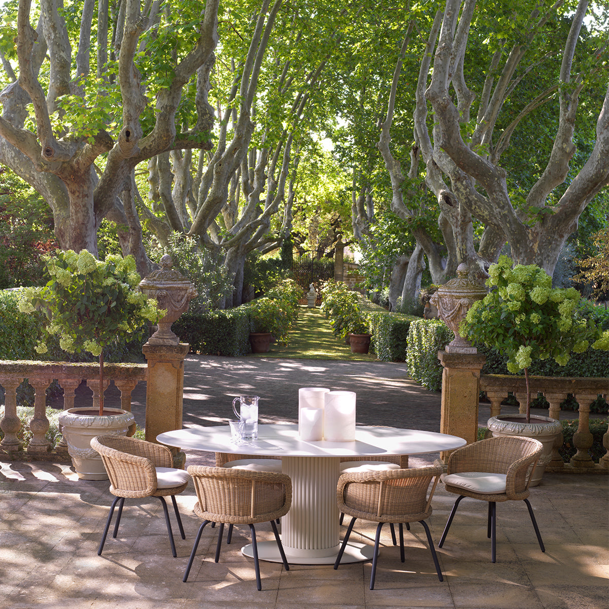 Outdoor Dining Table Volterra Oval sand finish cream ceramic