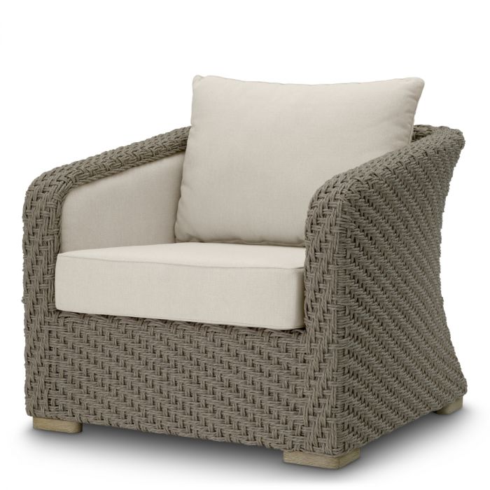 Silla de exterior Bryson de ratán sintético tejido en color arena viola