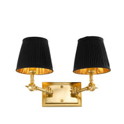 Lámpara de pared Wentworth con acabado dorado doble y pantallas negras.