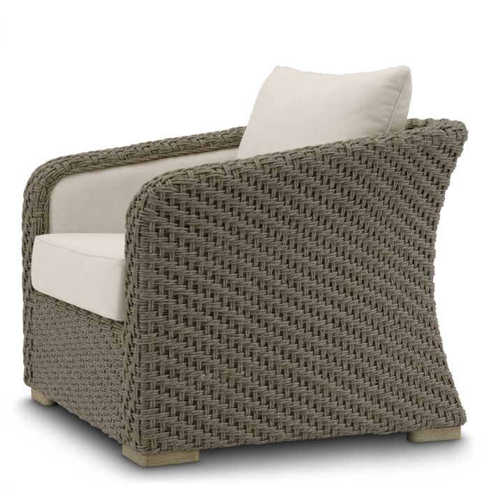 Silla de exterior Bryson de ratán sintético tejido en color arena viola