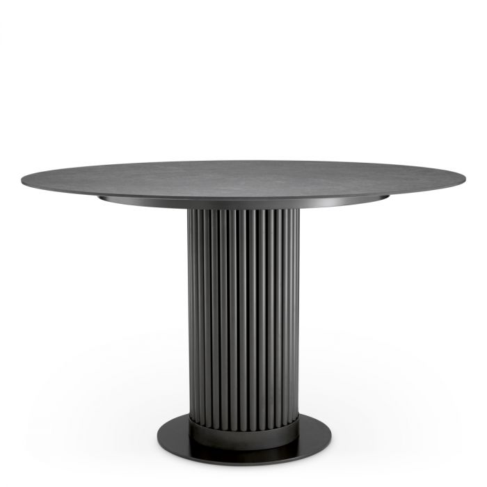 Mesa de comedor exterior Volterra redonda de cerámica gris con acabado bronce