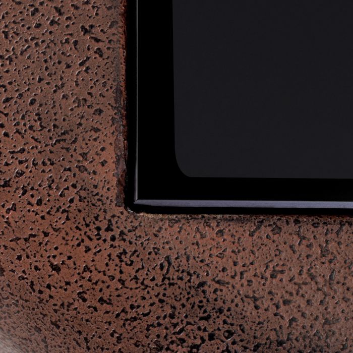 Mesa auxiliar Quentin de cristal negro con aspecto oxidado